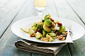Brussels sprout salad with pear and walnuts