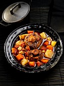 Braised ox tails with root vegetables and celery