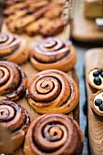 Cinnamon buns and blueberry tartlets