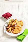 Pork escalope with fried potatoes and beetroot salad