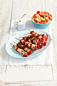 Chicken, onion and pepper skewers with a pasta salad