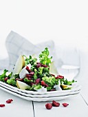 Green kale salad with pears and cranberries