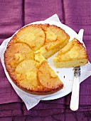 Upside-down pineapple cake with saffron, sliced
