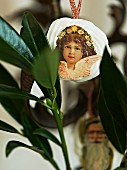 Meringue Christmas tree ornaments decorated with old-fashioned pictures
