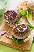 Pork and sage burgers with onions and mayonnaise