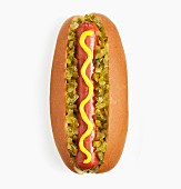 A hot dog with relish and mustard