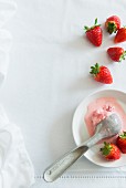 Strawberry ice cream and fresh strawberries