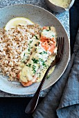 Salmon with dill sauce and rice