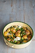 Roasted new potatoes with capers and melted cheese
