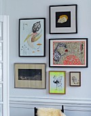 Framed drawings on wall