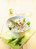 Rice pudding with pears and roasted sesame seeds