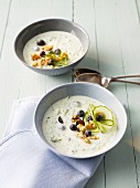 Cold cucumber soup with blueberries and nuts