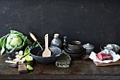 An arrangement of kitchen utensils and ingredients for oriental cuisine