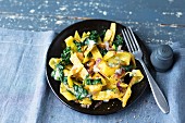 Crispy fried pasta with bacon and chard