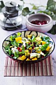Aubergine and pumpkin salad with blue cheese and pomegranate seeds