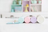 Kitchen shelving modules made from wooden crates painted in pastel shades