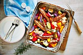 Roasted vegetables with sausages