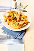 Chicken legs with sage and fries