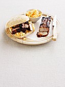 A spare rib sandwich with coleslaw