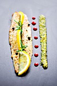 Grilled mackerel fillet with lemon, rosemary, salsa verde and pomegranate syrup