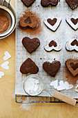 Heart-shaped chocolate cakes with icing sugar