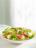 An oriental salad with cucumber, grapefruit and coriander