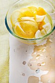 Lemons in brine in a glass bowl