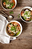 Oriental chicken and prawn soup with bean sprouts