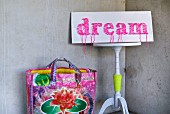 DIY sign with pink string art motto