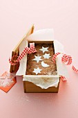 Christmas chocolate cake baked in a wooden box