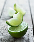 A lime half and a lime wedge