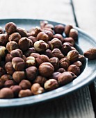 Hazelnuts on a metal plate