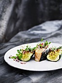 Salmon and courgettes with apple and onion vinaigrette garnished with chervil