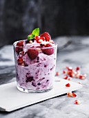 Berry yoghurt with pomegranate seeds