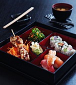 Japanese food in a square varnished box
