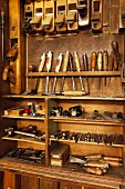 Antique woodworker's cabinet with various tools