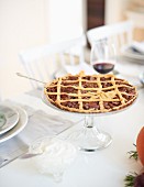 Pecan lattice tart a table laid for Thanksgiving