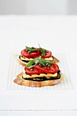 Bruschetta with aubergines, Haloumi, tomatoes and basil