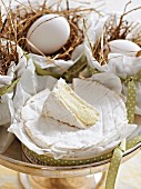 Camembert and eggs in a nest for an Easter brunch