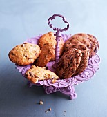 Chocolate chip cookies on a purple cake stand