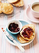 Buttermilk pikelets (Australian pancakes) with raisins and jam