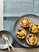 Vegetable tartlets with fried eggs
