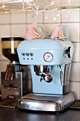 Pastel-blue, retro coffee machine