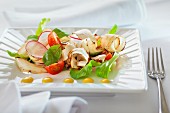Black salsify salad with radishes and tomatoes