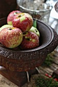 Apples in iron dish