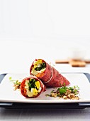 Beetroot wraps filled with goats cheese, dukkah, carrots and hard-boiled eggs