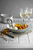 Caramelised mango skewers with lemongrass ice cream