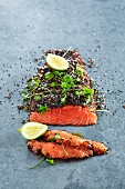 Salmon fillets with black sesame seeds, chervil and limes