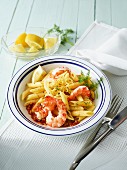 Penne with lemon sauce and prawns