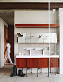 Simple, custom washstand with exotic wood fronts in ensuite bathroom